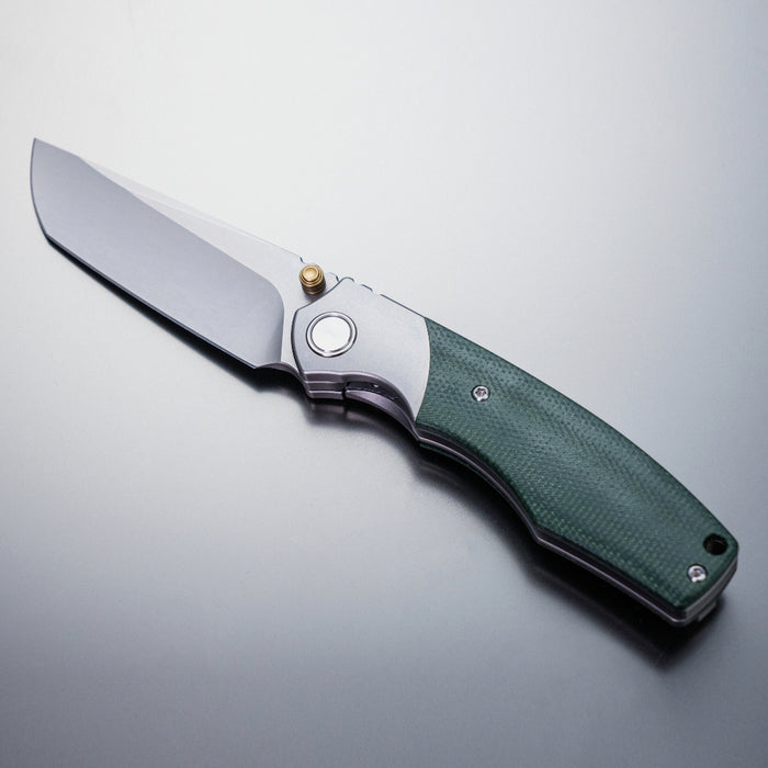 Ships Sept 30 from Ohio Vixino x Caveman Baby Bronto - Pocket Knife - S35VN -Titanium Bolsters with Micarta - X902-M1
