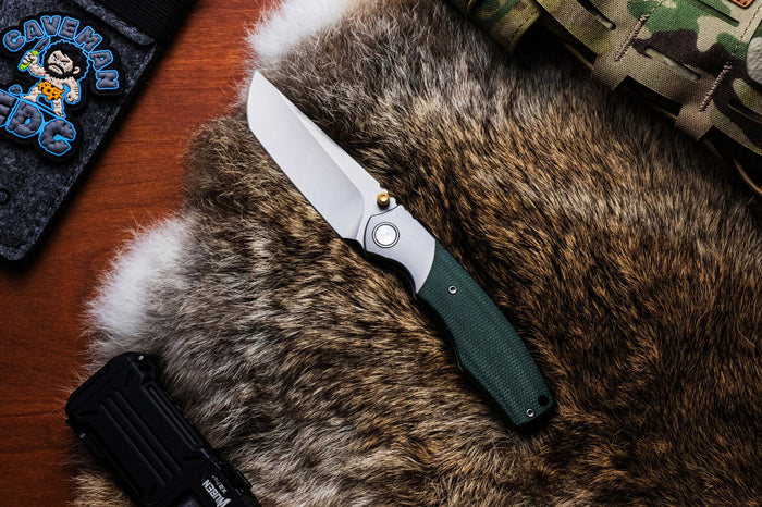 Ships Sept 30 from Ohio Vixino x Caveman Baby Bronto - Pocket Knife - S35VN -Titanium Bolsters with Micarta - X902-M1
