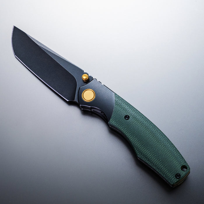Ships Sept 30 from Ohio Vixino x Caveman Baby Bronto - Pocket Knife - S35VN -Titanium Bolsters with Micarta - X902-M2