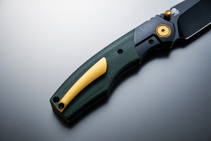 Ships Sept 30 from Ohio Vixino x Caveman Baby Bronto - Pocket Knife - S35VN -Titanium Bolsters with Micarta - X902-M2